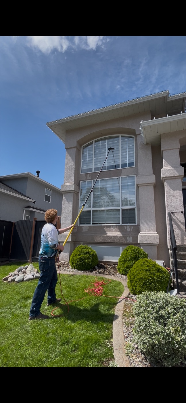 Powerhouse Pressure Washing crew washing a townhouse exterior in Clearbrook, Abbotsford