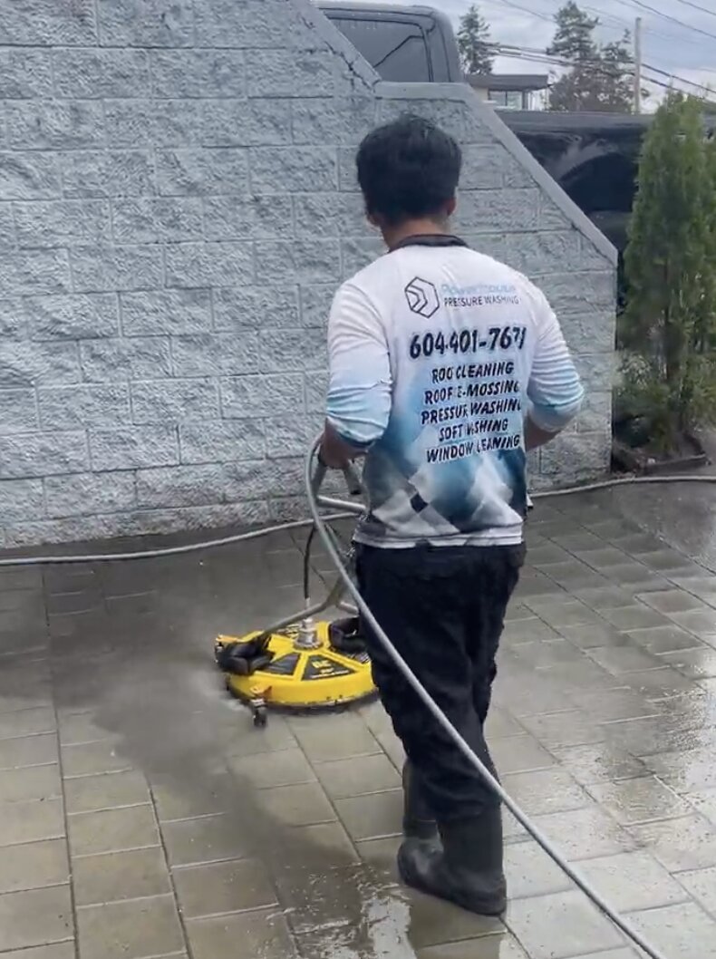 Powerhouse Pressure Washing crew washing a townhouse exterior in Clearbrook, Abbotsford
