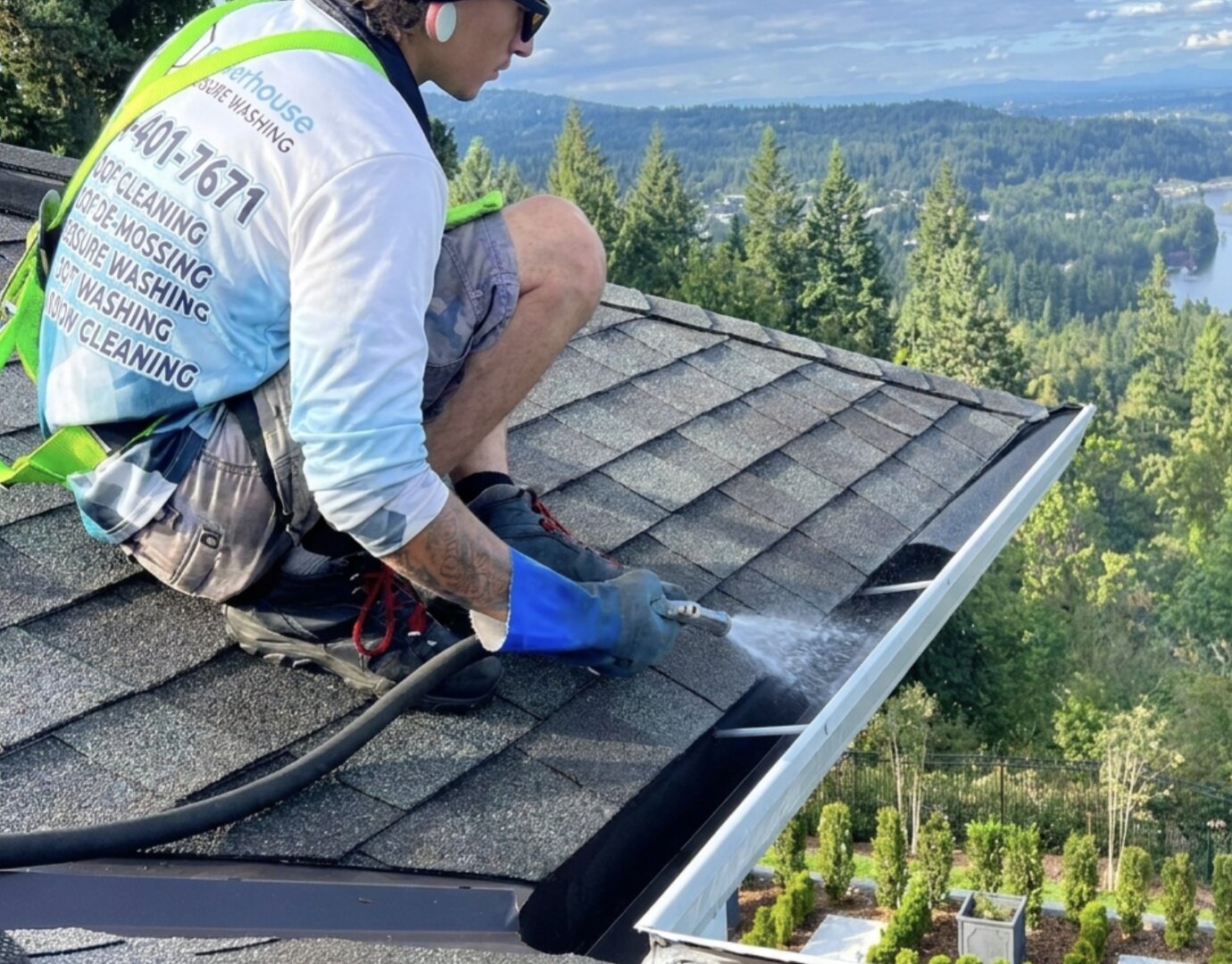 Soft wash reaching the upper floors and roofline of a 3-story Abbotsford townhouse